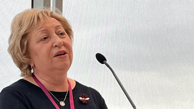 Attēls ar CSP priekšnieci Aiju Žīguri